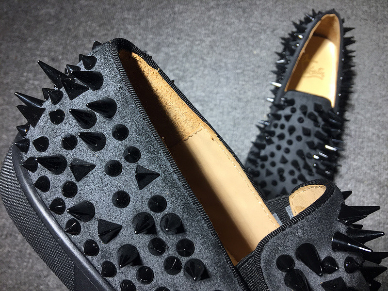red bottom flats with spikes