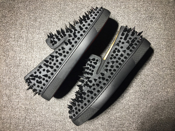 red bottom flats with spikes