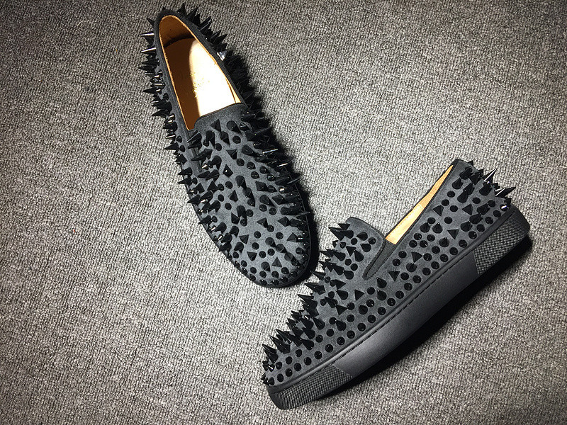 red bottom flats with spikes