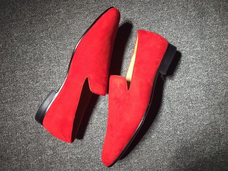 male shoes with red soles