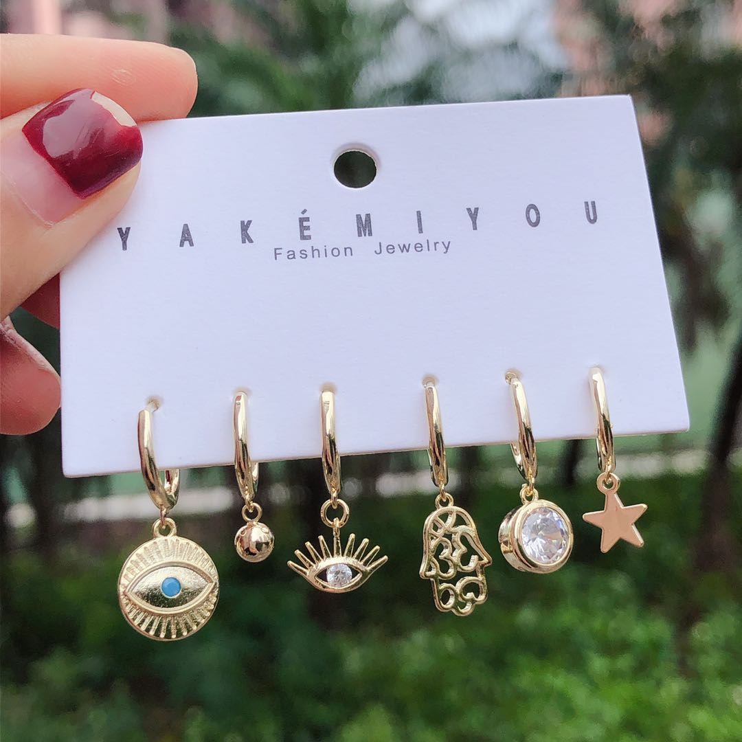 Set hand eyes charms earring