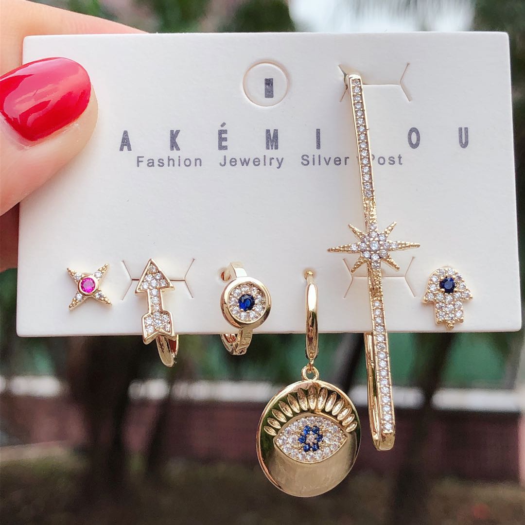 Set pave eyes charm earring