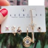 Set pave eyes charm earring