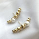 Brass beaded long ear stud