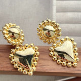Gold heart drop earring