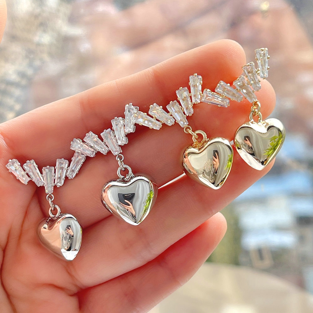Crystal ear stud with light heart charm
