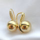 Gold ball with S hoop earring