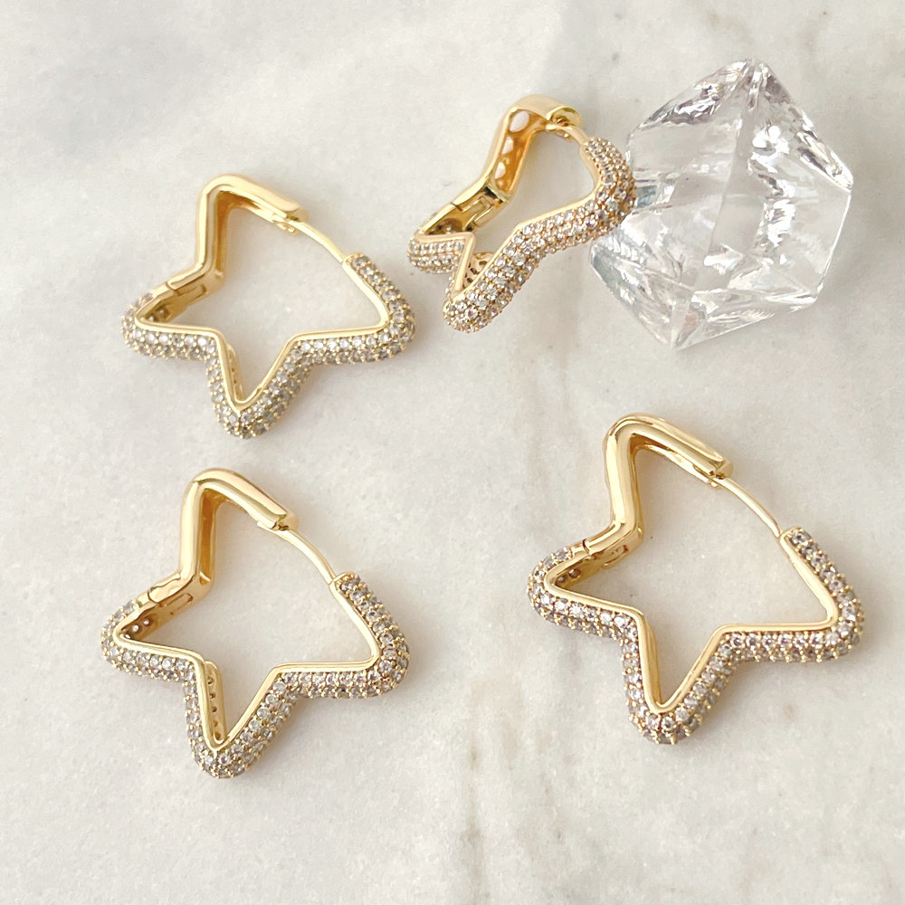 Gold pave heart earring