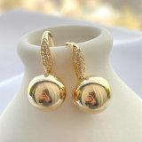 Gold ball with S hoop earring