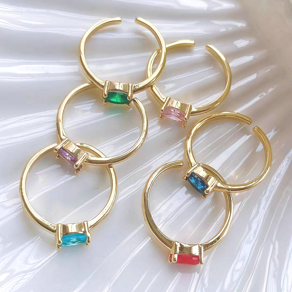 Egg shaped colored stone adjustable ring