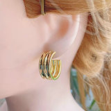 Gold width metal C hoop earring
