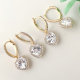 Pave hoop earring with heart charm