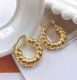 Gold metal twist earring