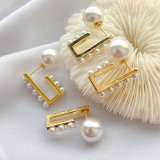 Small pearl u hoop earring