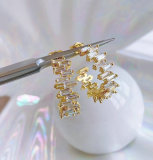 Pave zircon C hoop earring