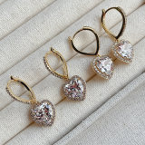 Pave hoop earring with heart charm