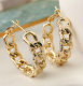 Gold metal chain hoop earring