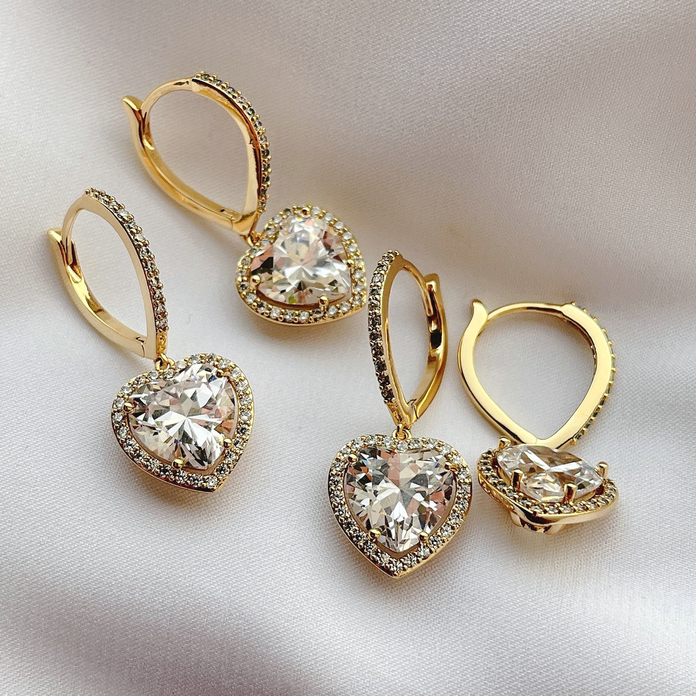 Pave hoop earring with heart charm