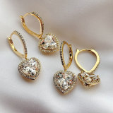 Pave hoop earring with heart charm
