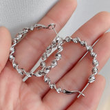Twist hoop earring