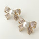 Bow pearl earrings