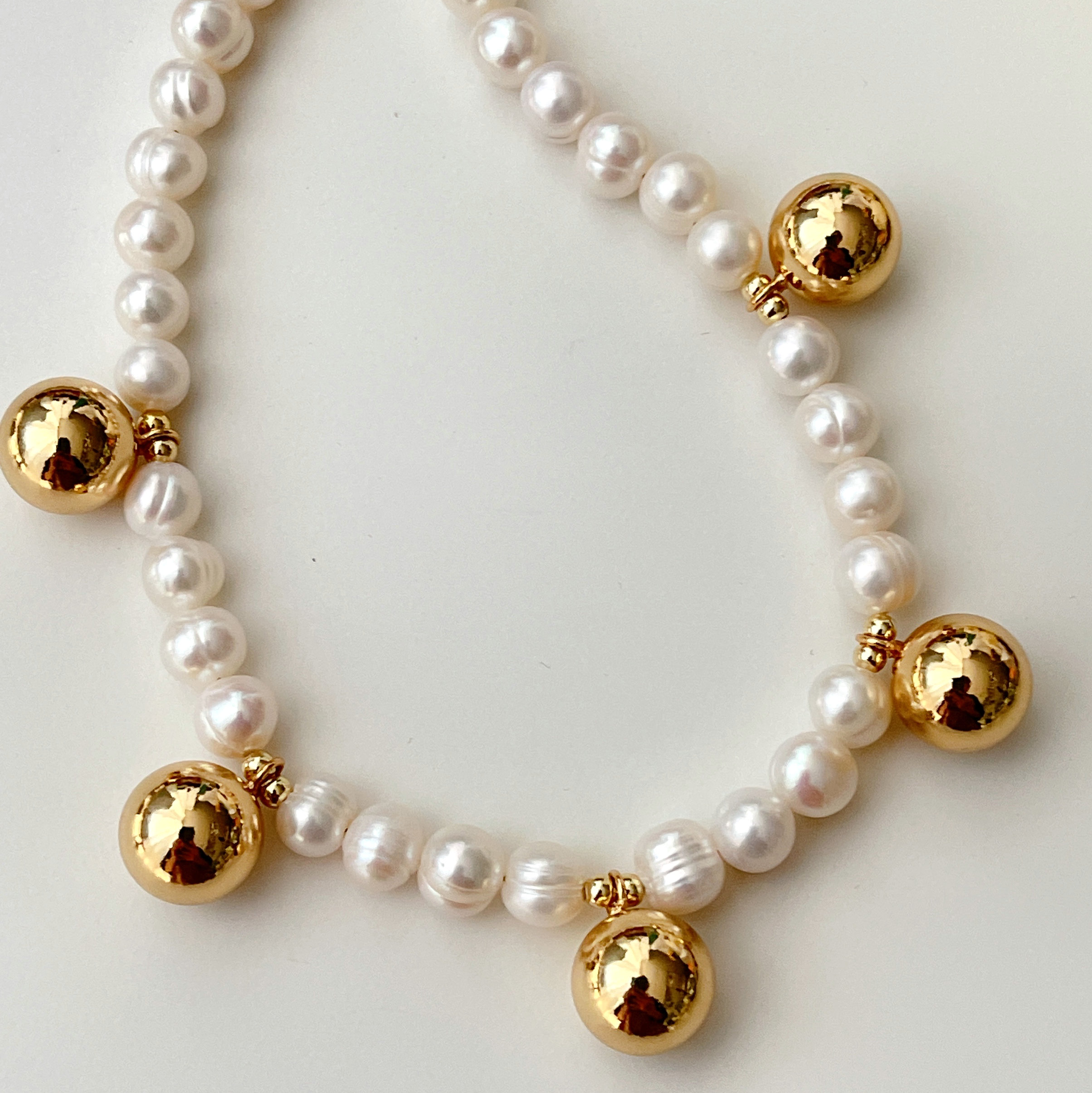 Round Pearl Necklace with Gold Ball Charm