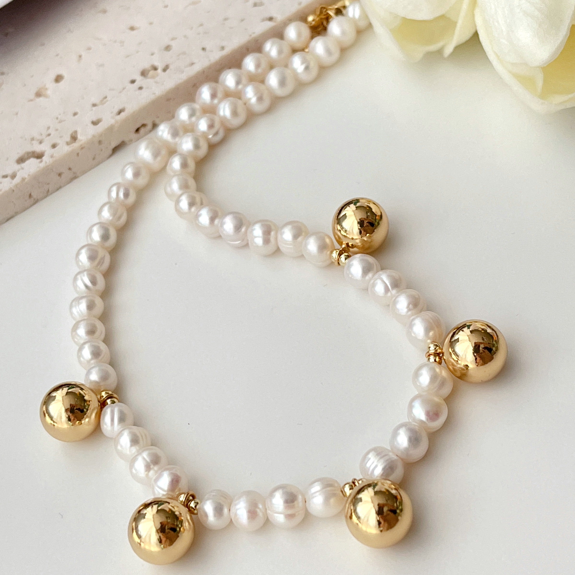 Round Pearl Necklace with Gold Ball Charm