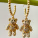 Gold Beaded Hoop Earrings With Bear pendant