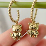 Gold Beaded Hoop Earrings With Tiger pendant
