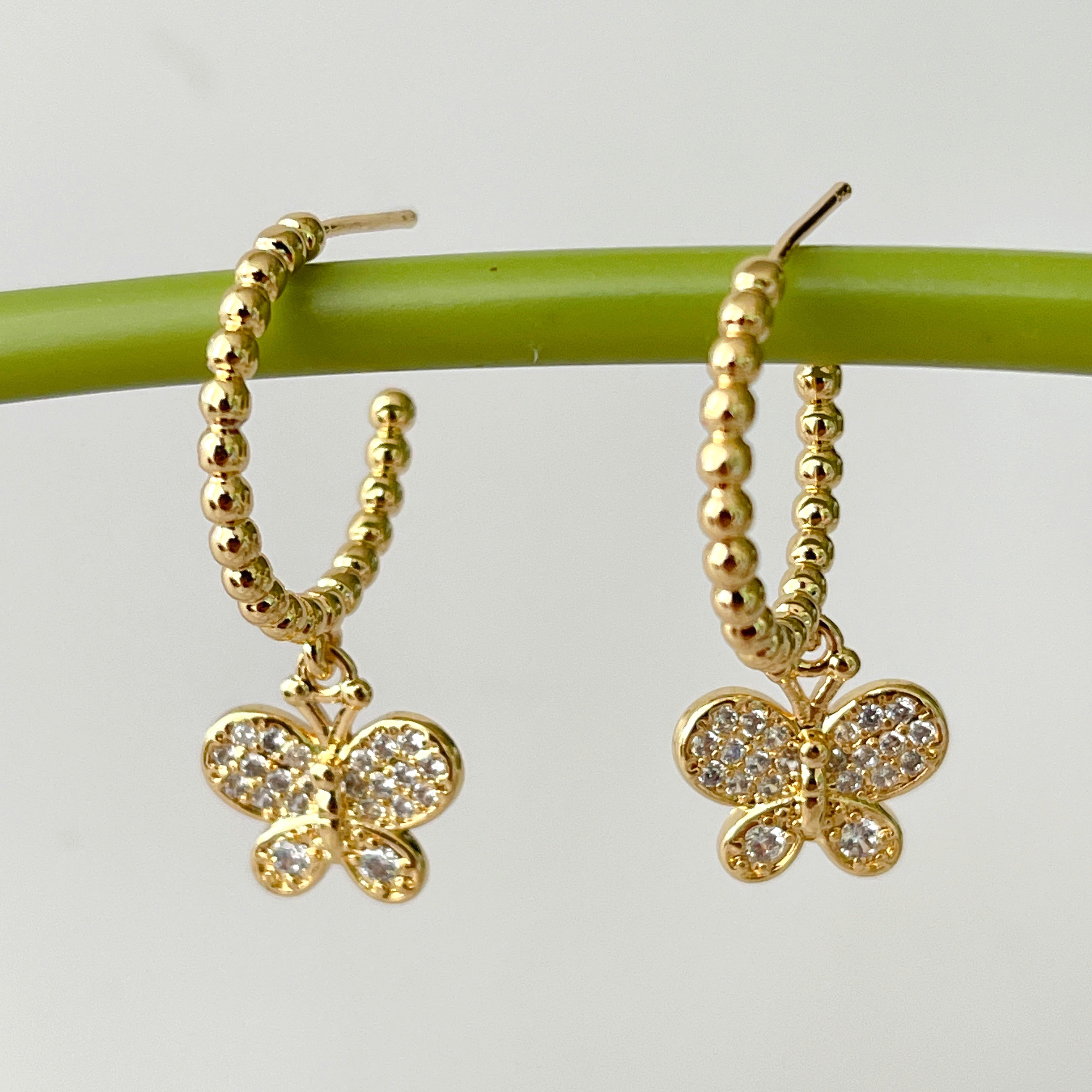 Gold Beaded Hoop Earrings With Butterfly Pendant