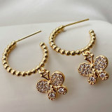 Gold Beaded Hoop Earrings With Butterfly Pendant