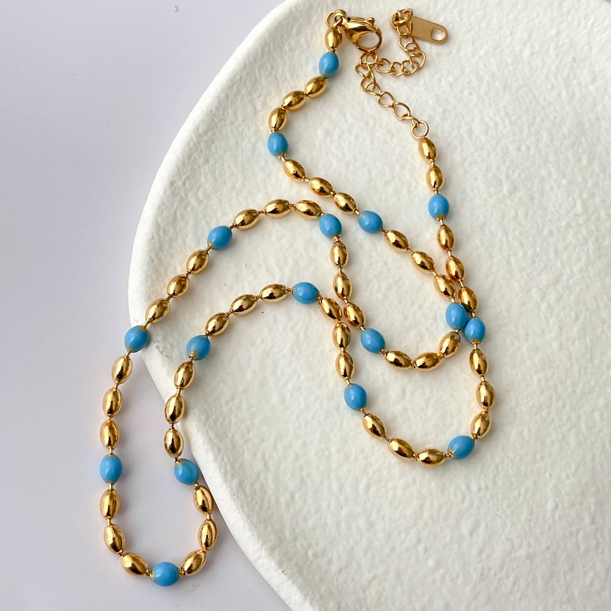Stainless Steel Oval Ball Necklace With Blue Beaded