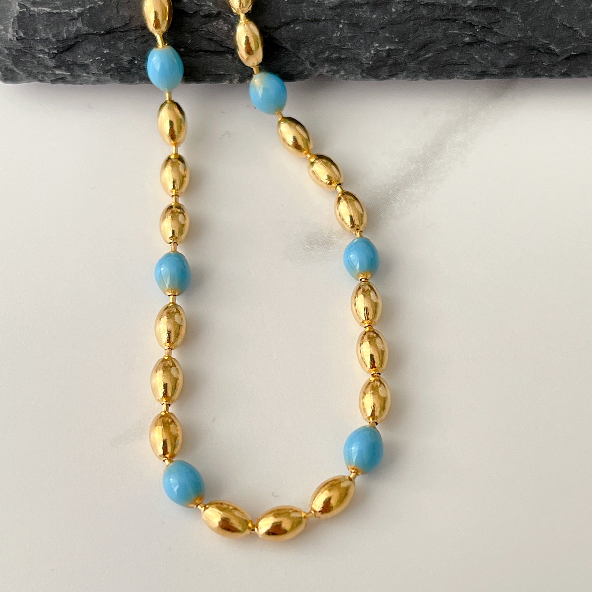 Stainless Steel Oval Ball Necklace With Blue Beaded