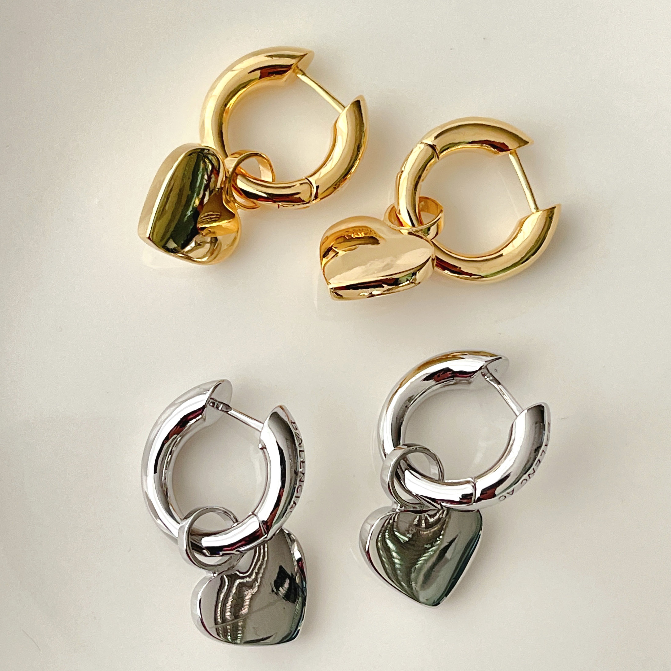 Hoop Earrings With Heart Pendant