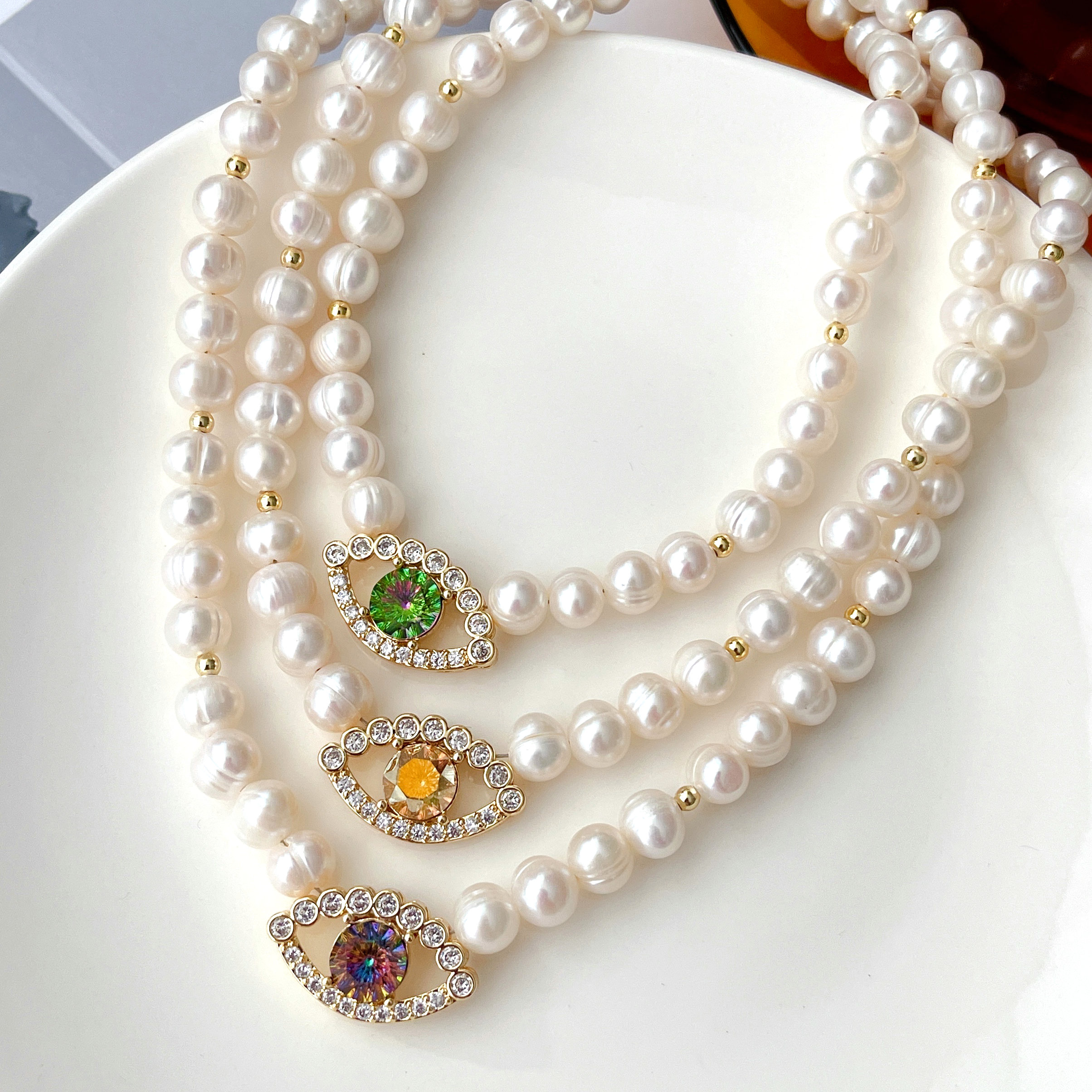 Fresh Water Pearl With Eye Charm