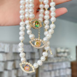 Fresh Water Pearl With Eye Charm