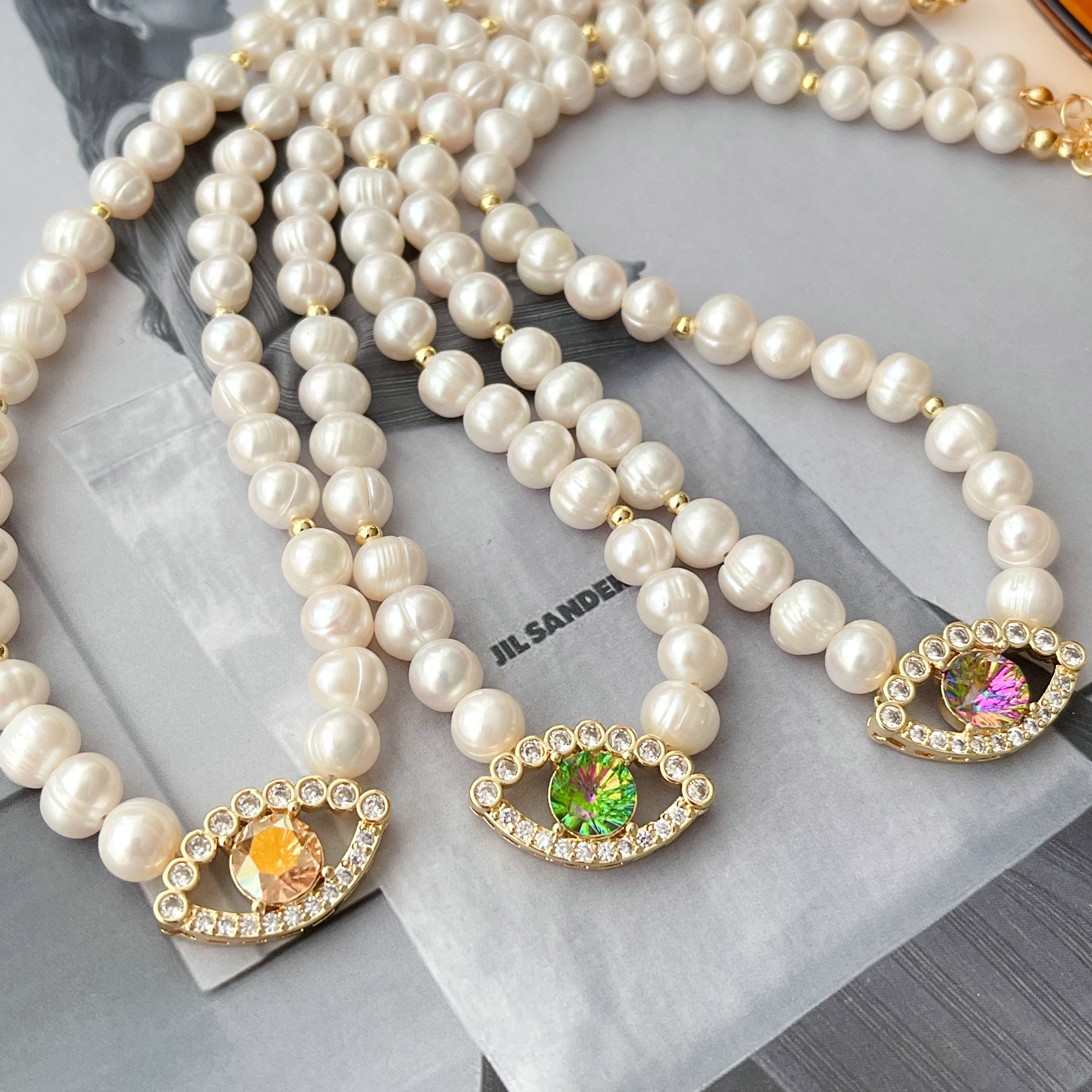 Fresh Water Pearl With Eye Charm