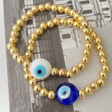 Blue / White Evil Eye Gold Beaded Elastic Bracelet