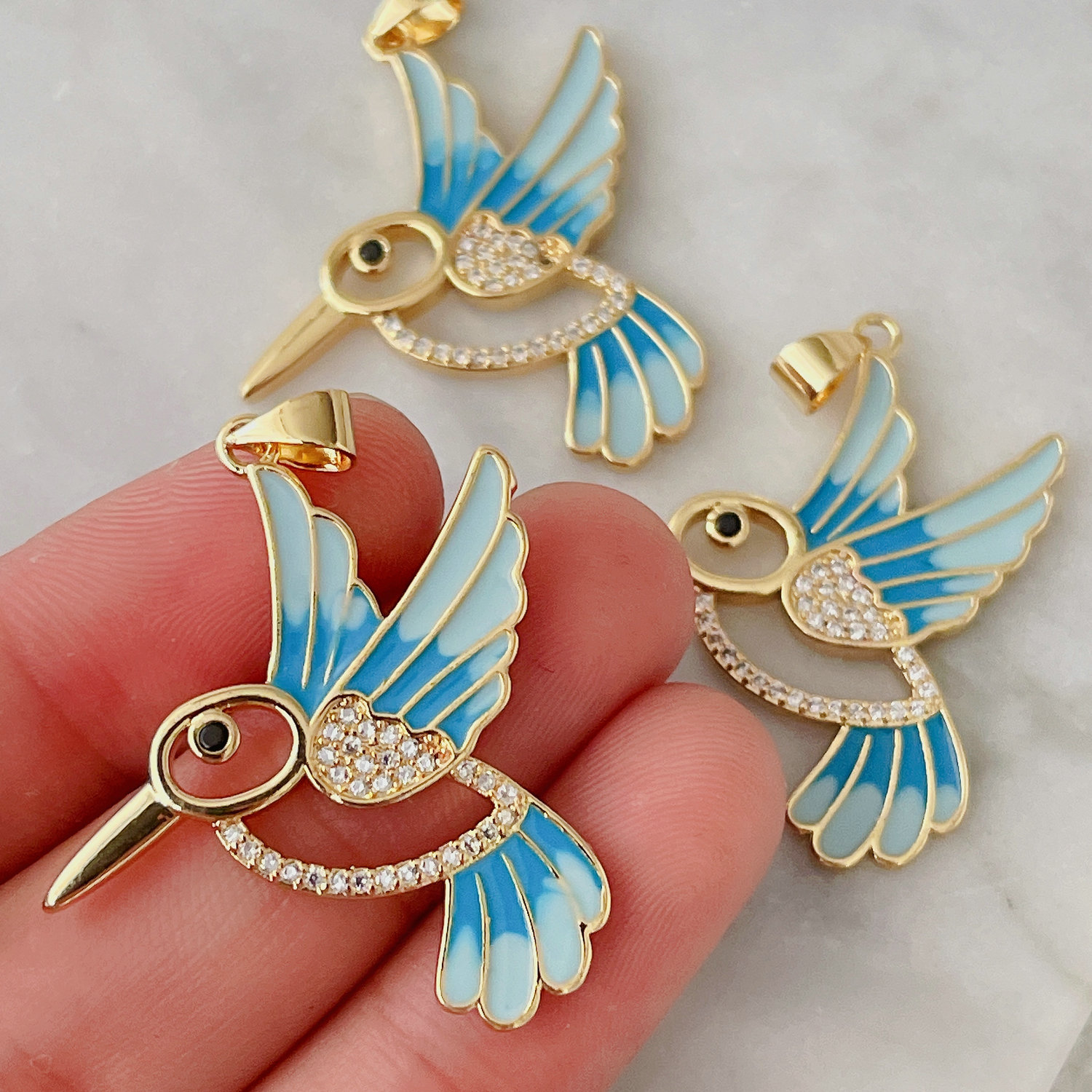 Blue enamel bird charm