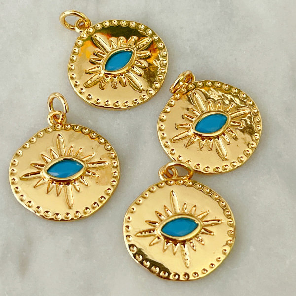 Green round eye charm