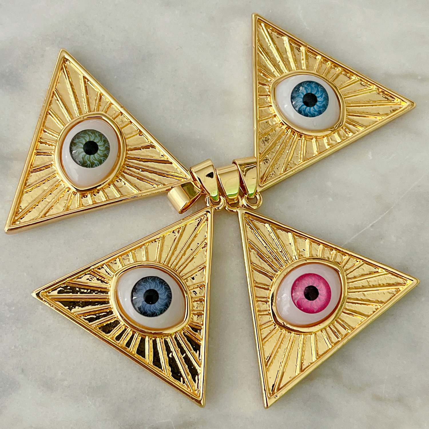 Triangle eye charm