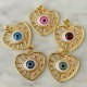 Glass eye heart charm