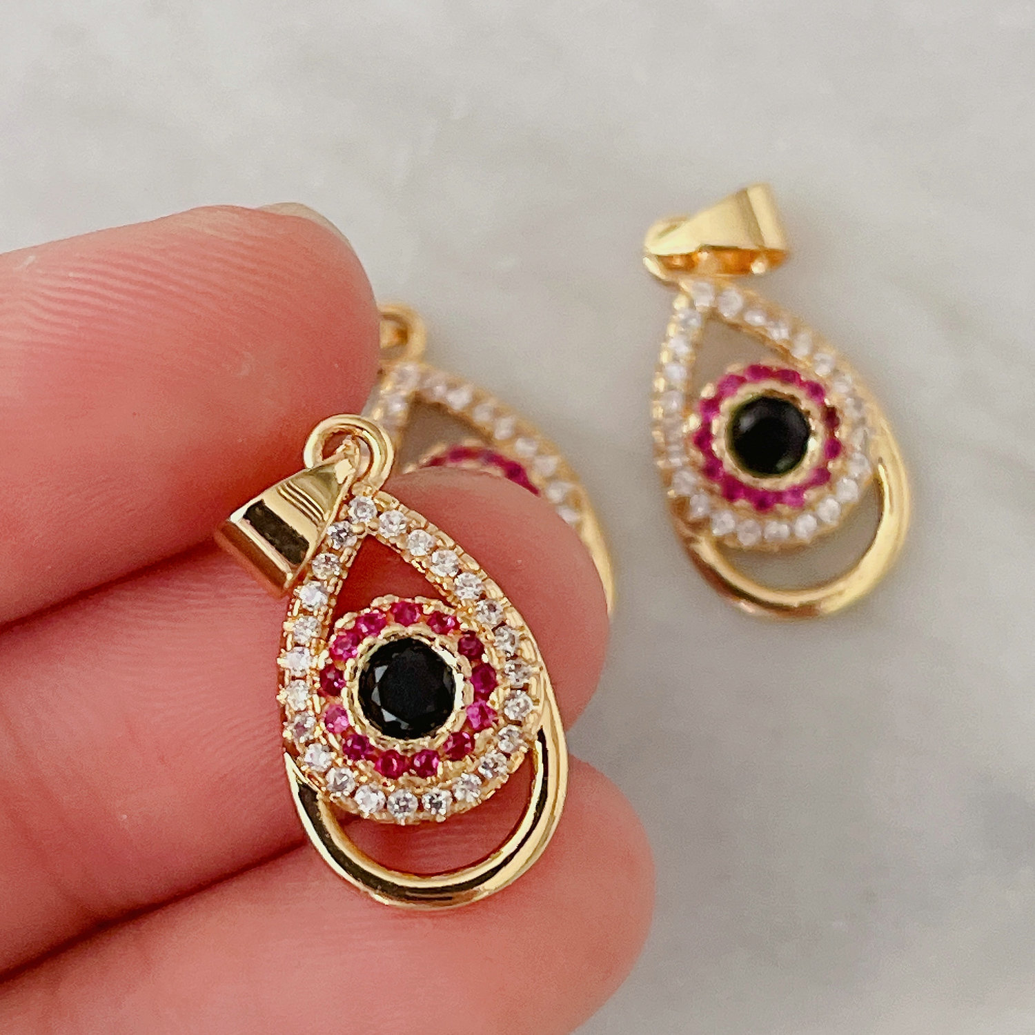 Red eye charm