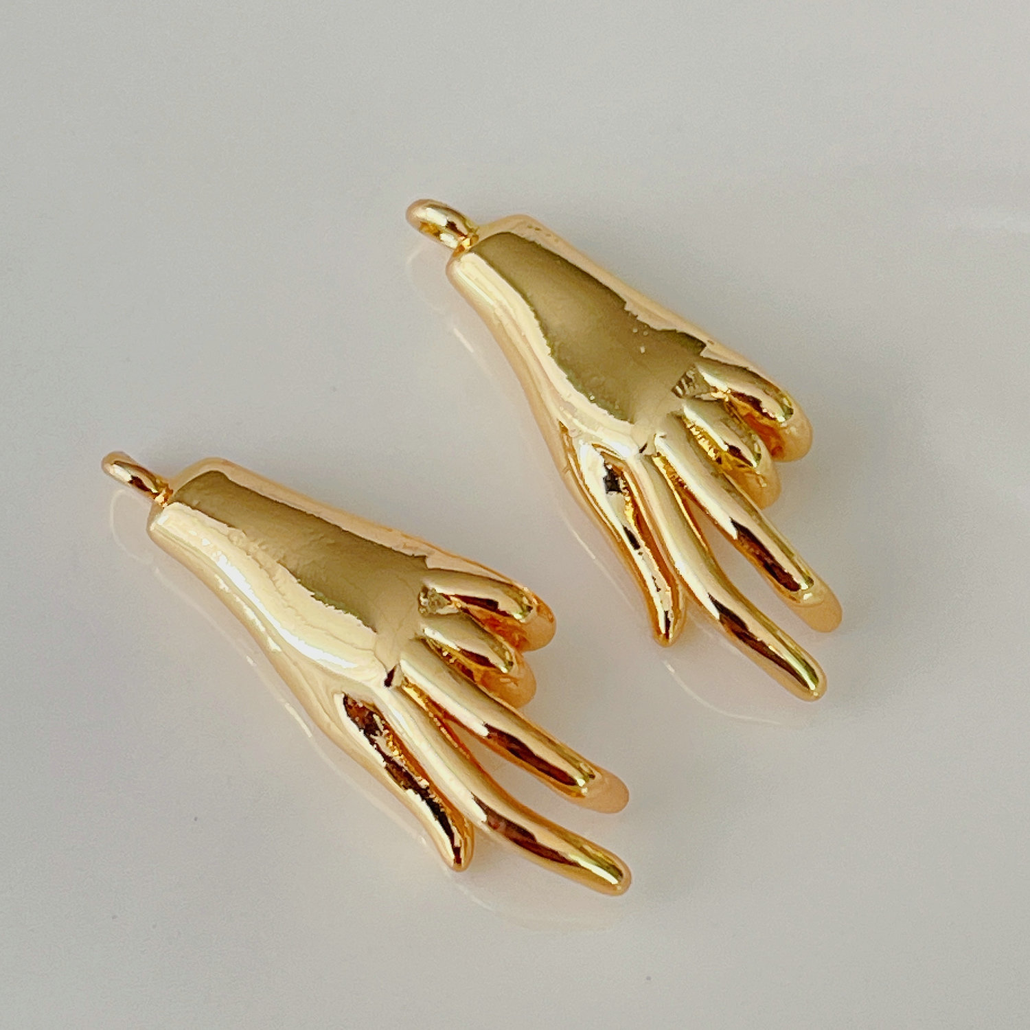 Hand charm