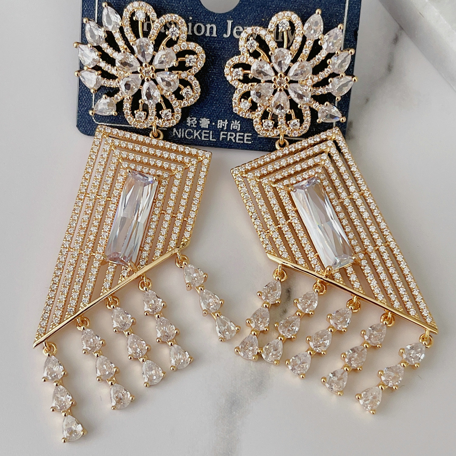 Long flower zircon earrings