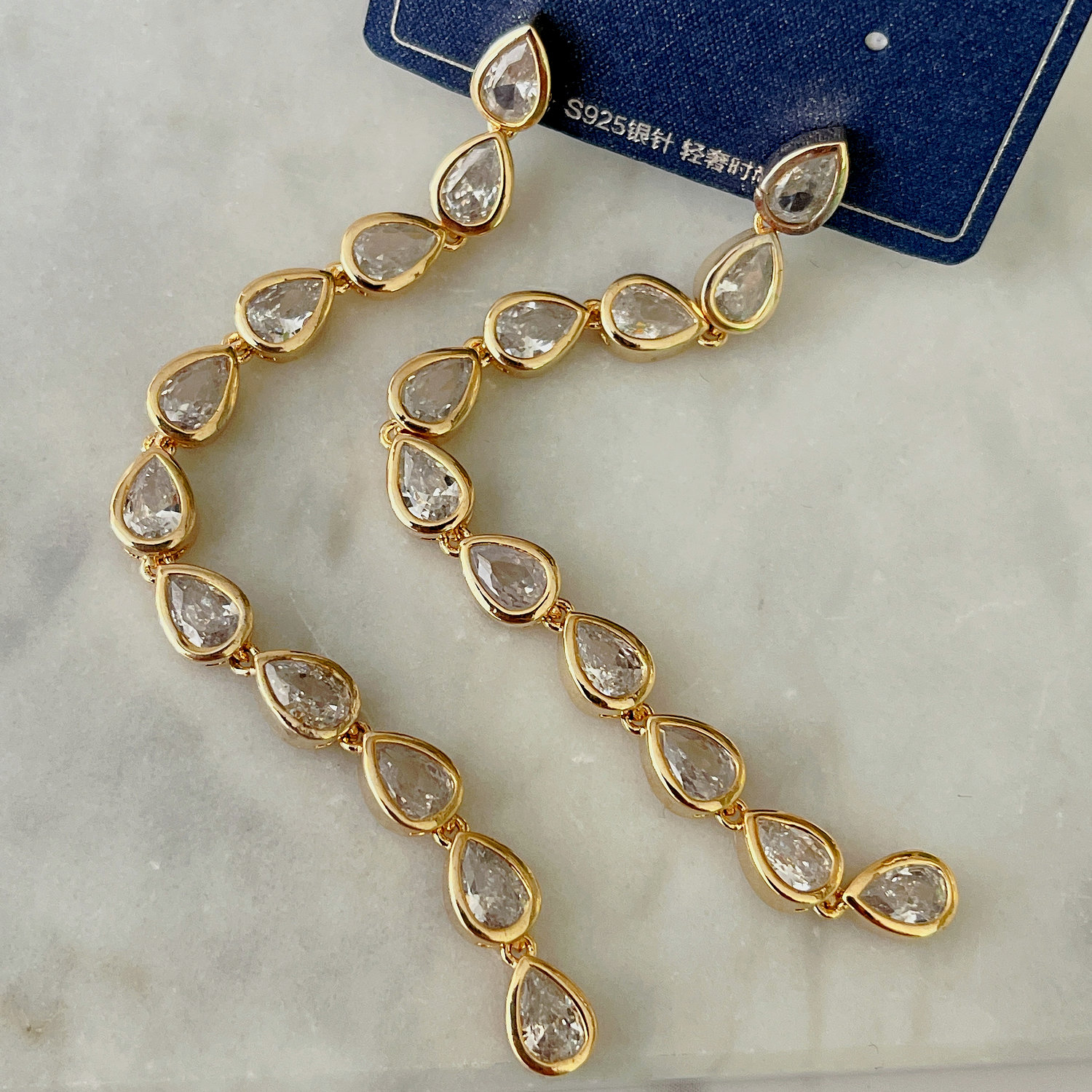 Long zircon earrings