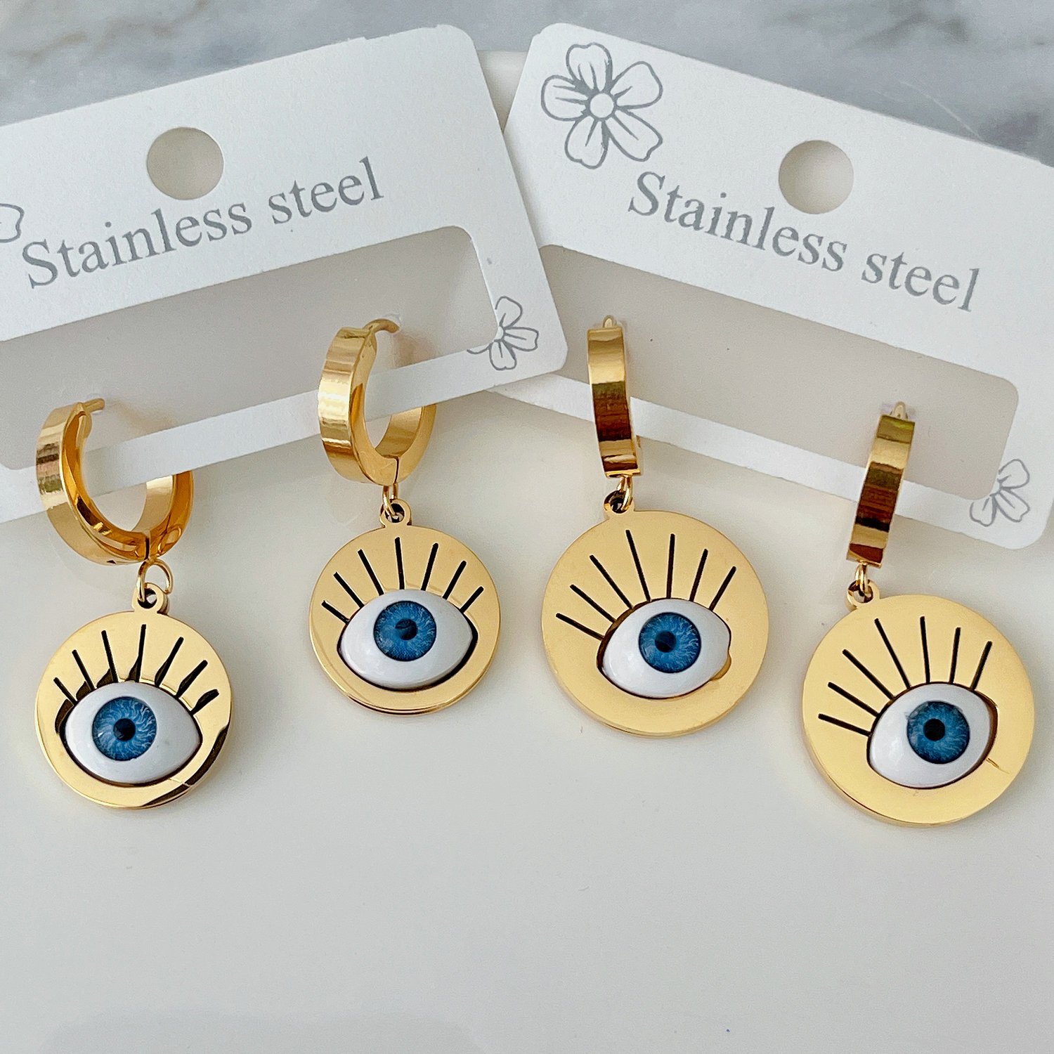 Stainless steel round eye earrings