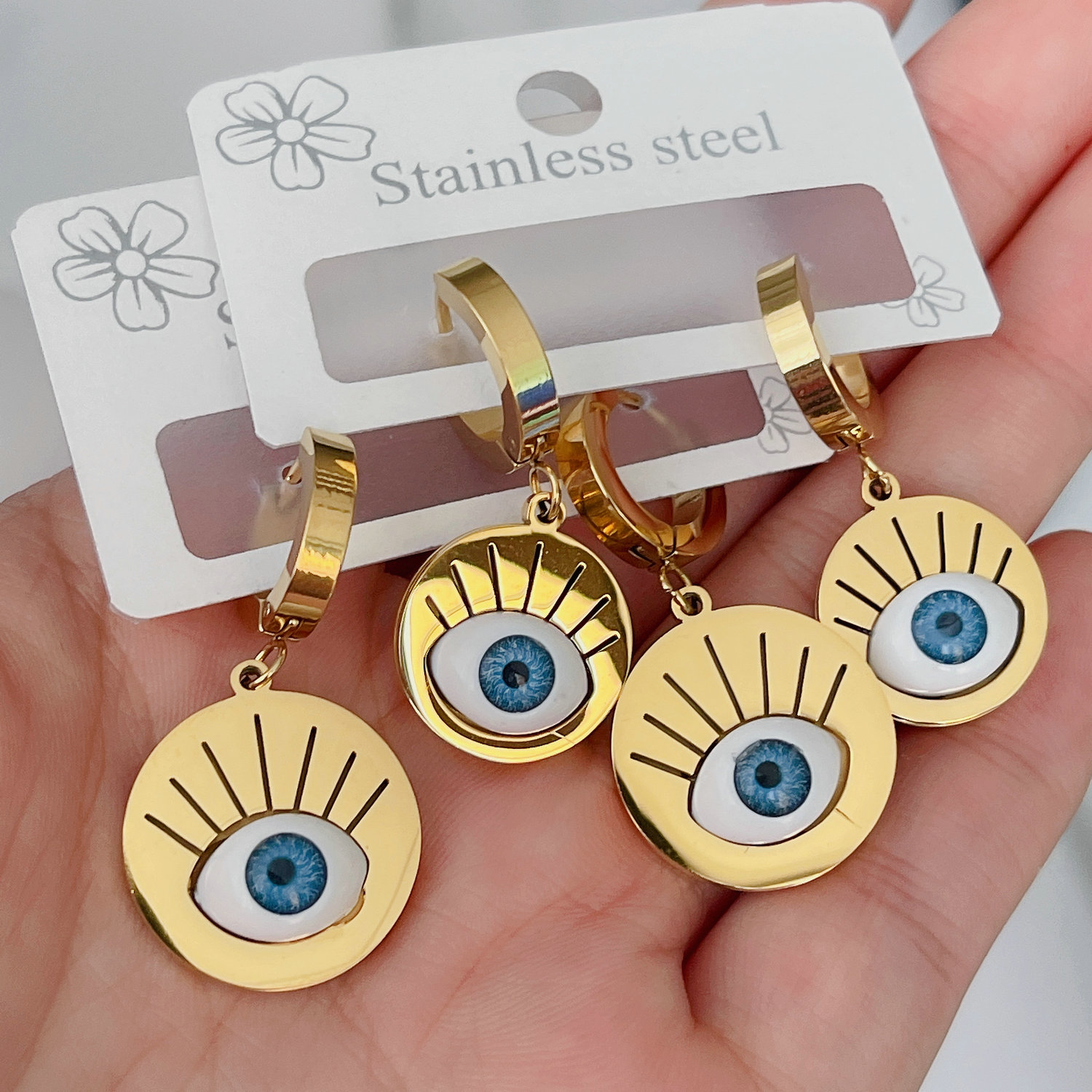 Stainless steel round eye earrings