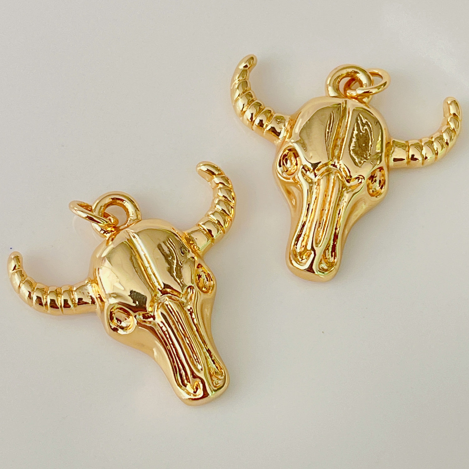 Gold metal horn charm