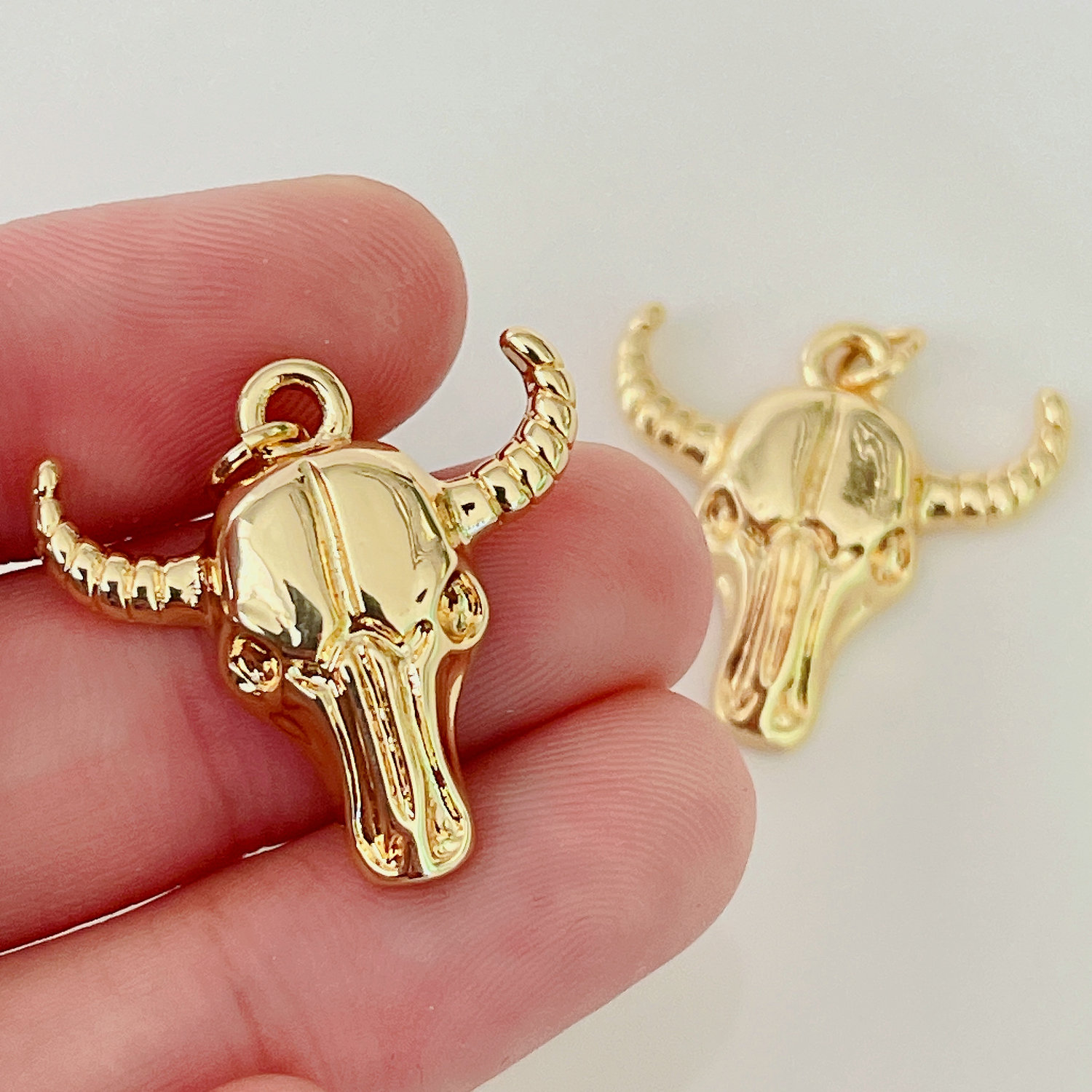 Gold metal horn charm